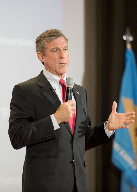 Delaware Governor John C. Carney, Jr. gives the welcoming remarks at the Transition Summit March 15, 2017, at Dover Air Force Base, Del. The three-day summit was sponsored by the U.S. Chamber of Commerce and Hiring Our Heroes, a nationwide initiative aimed at helping transitioning service members, military spouses and veterans find employment opportunities. (U.S. Air Force photo by Mauricio Campino)
