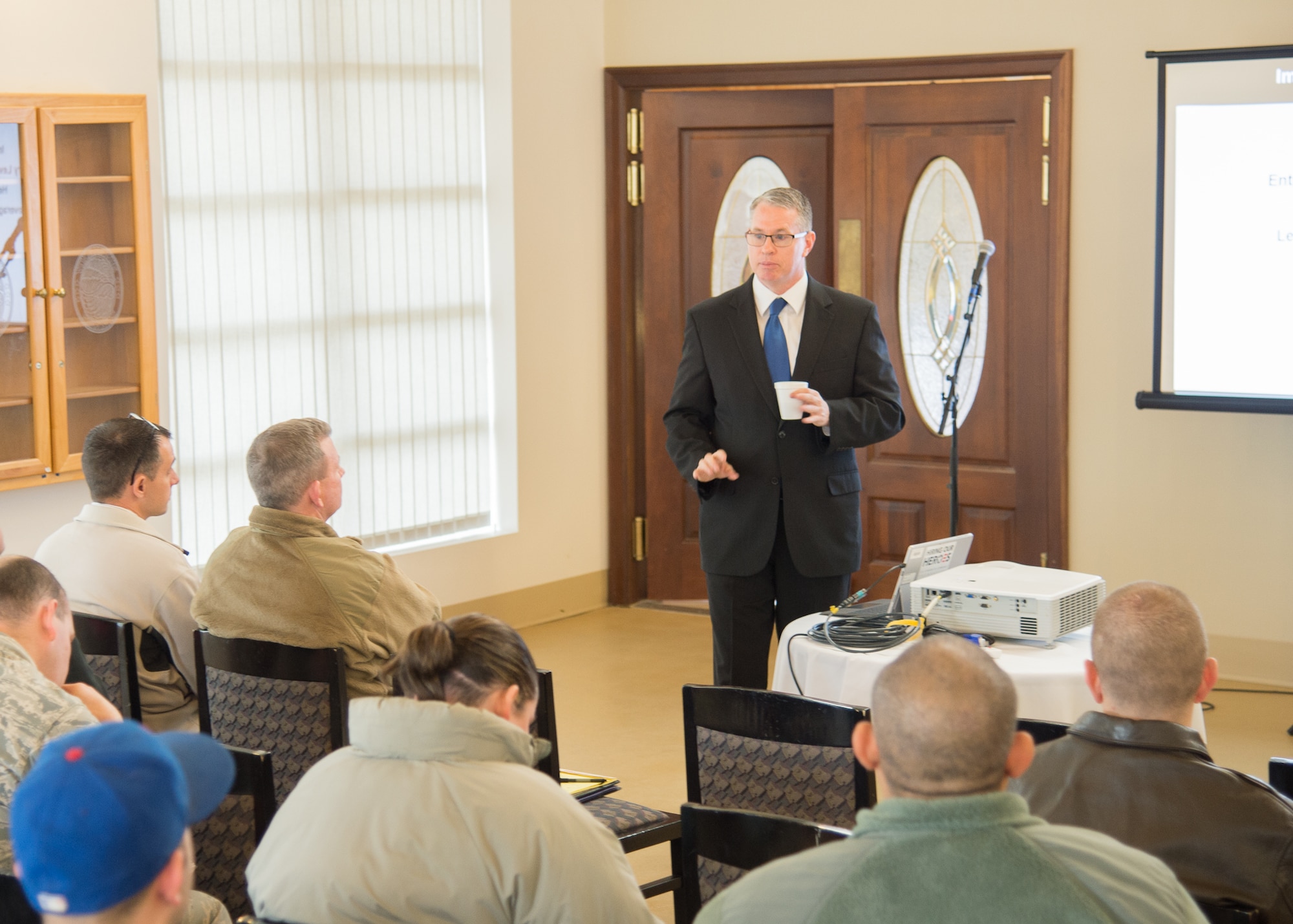 Brad Bentley, President of Fastport Inc., speaks to members of Team Dover during the industry briefs portion of the Transition Summit March 15, 2017, at Dover Air Force Base, Del. Bentley discussed job availability and apprenticeship opportunities in the transportation and logistics industries. (U.S. Air Force photo by Mauricio Campino)