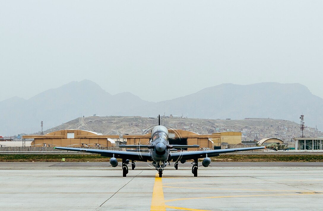 Four A-29 Super Tucanos arrive at Kabul Air Wing, Kabul, Afghanistan, March 20, 2017, before the beginning of the 2017 fighting season. The aircraft will bolster the Afghan Air Force's inventory from eight to 12 A-29s in country. Airmen from Train, Advise, Assist Command-Air, as part of Resolute Support Mission, work shoulder-to-shoulder with their Afghan counterparts fostering a working relationship and fortifying confidence in the mission. (U.S. Air Force photo by Senior Airman Jordan Castelan)