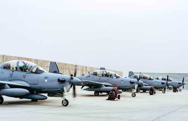 Four A-29 Super Tucanos arrive at Kabul Air Wing, Kabul, Afghanistan, March 20, 2017, before the beginning of the 2017 fighting season. The aircraft will bolster the Afghan Air Force's inventory from eight to 12 A-29s in country. Airmen from Train, Advise, Assist Command-Air, as part of Resolute Support Mission, work shoulder-to-shoulder with their Afghan counterparts fostering a working relationship and fortifying confidence in the mission. (U.S. Air Force photo by Senior Airman Jordan Castelan)