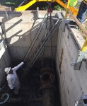 Defense Fuel Support Point San Pedro contractors perform underground storage tank closure procedures. After 37 years, the DFSP San Pedro government owned, government operated fuel facility is closing tanks to achieve infrastructure savings and reduce costs for the Department of Defense.