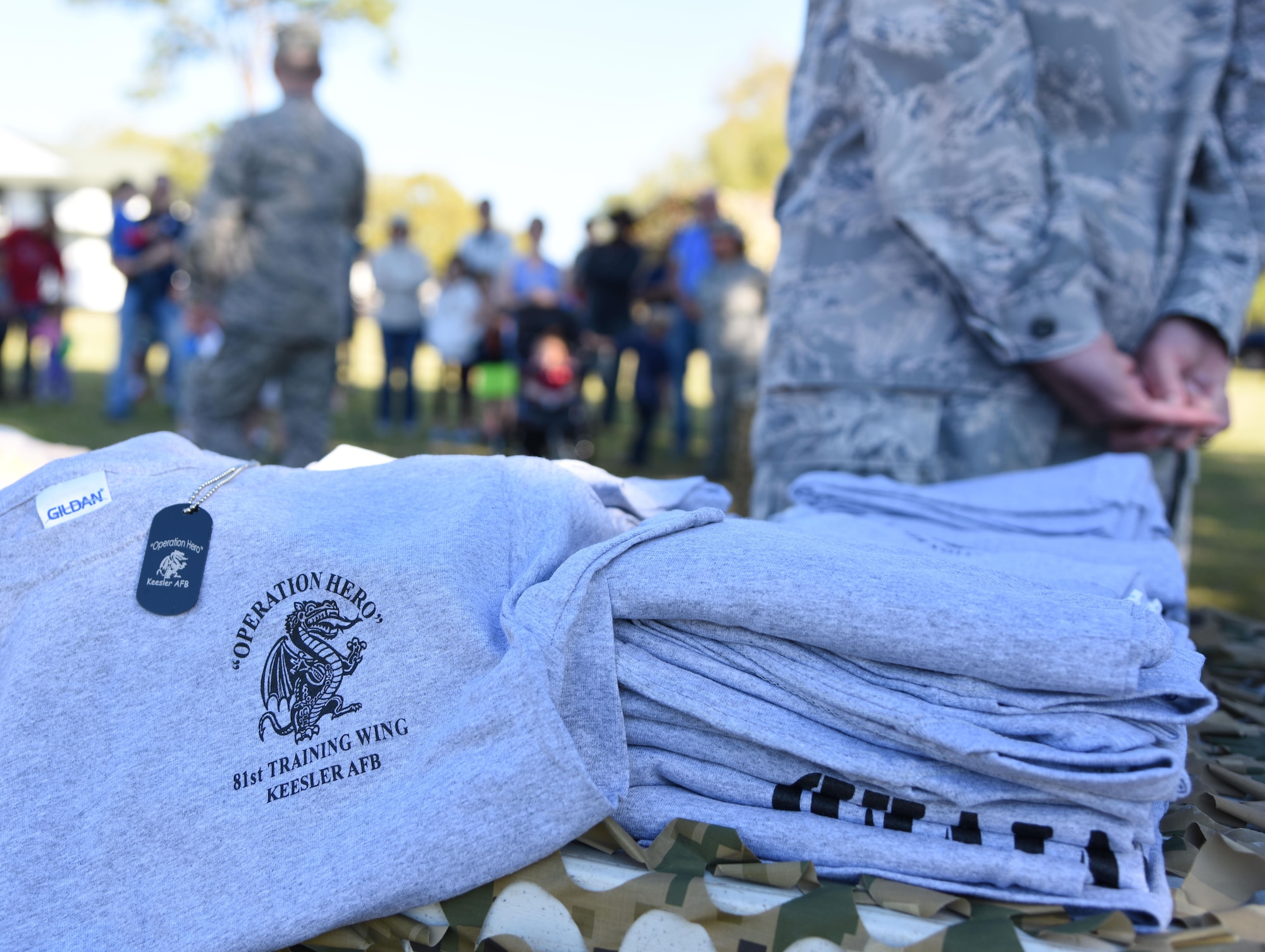 T-shirts and dog tags sit on display during Operation Hero March 18, 2017, on Keesler Air Force Base, Miss. The activities at the event were designed to help children better understand what their parents do when they deploy. (U.S. Air Force photo by Kemberly Groue)