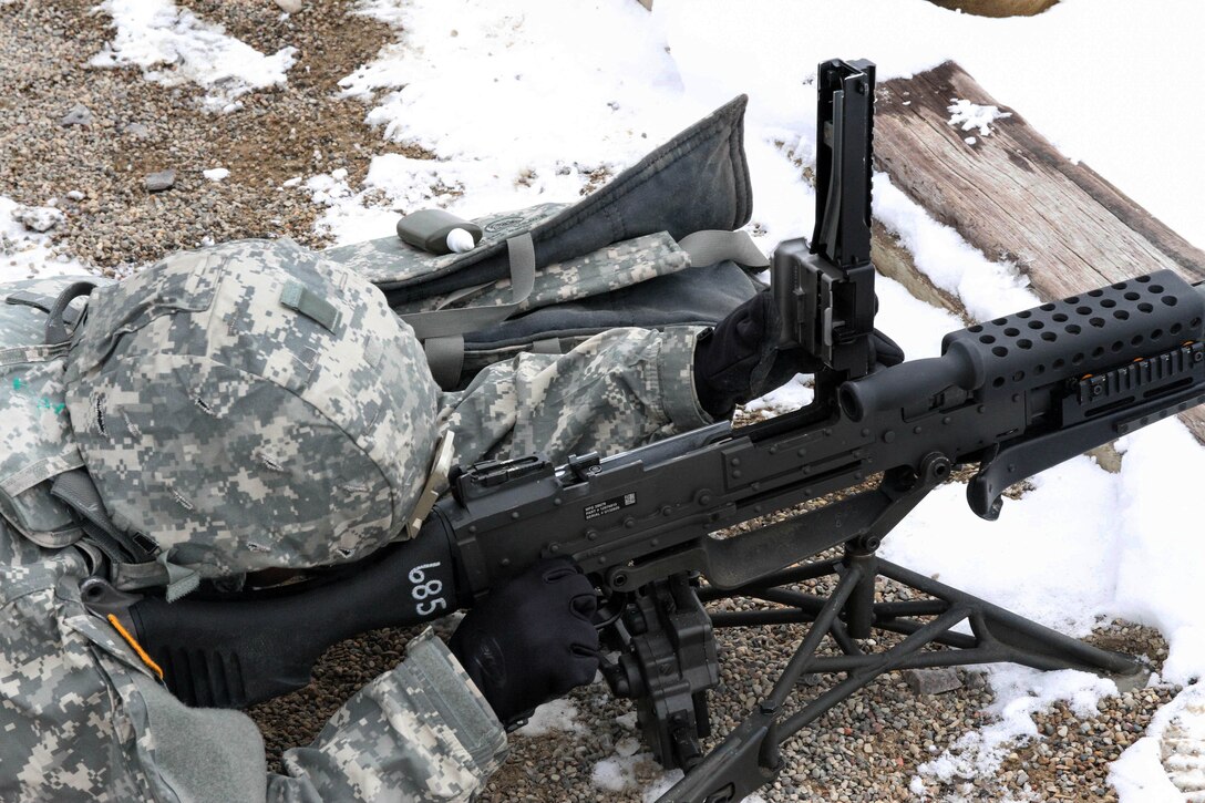An Army reservist waits for a range safety officer to clear her M240B machine gun while zeroing during Operation Cold Steel at Fort McCoy, Wis., March 13, 2017. Army Reserve photo by Staff Sgt. Debralee Best