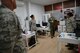 U.S. Air Force Col. Thomas Torkelson, 100th Air Refueling Wing commander, speaks with Airmen March 16, 2017, on Naval Station Rota, Spain. Torkelson and Chief Master Sgt. Curtis Stanley, 100th ARW command chief, toured facilities where Airmen work to see how they are settling in. (U.S. Air Force photo by Senior Airman Christine Halan)