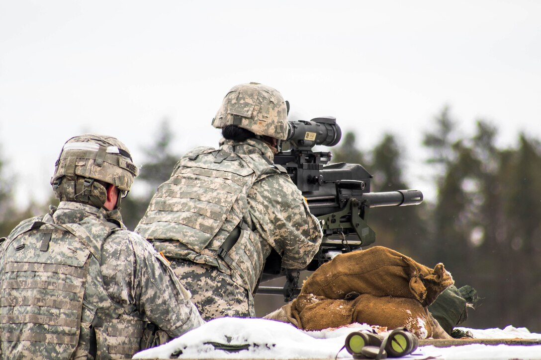 An Army reservist fires the MK-19 grenade launcher during Operation Cold Steel at Fort McCoy, Wis., March 13, 2017. The soldier is assigned to the 327th Engineer Company, 416th Theater Engineer Command. Army Reserve photo by Spc. Maurice Cheeks