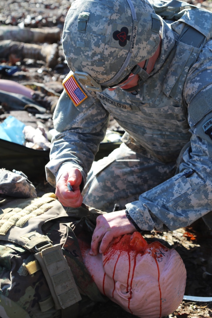 Spc. Levi Krecklow, combat medic for 1st Battalion, 506th Infantry Regiment, 101st Airborne Division, performs an incision on a simulated casualty during Brigade Combat Team Trauma Training on Fort Campbell, Ky., March 10. The BCT3 program ensures medics across the Army have the trauma and surgical skills to manage combat casualties prior to a deployment. BCT3 is led by a staff of experts from the U.S. Army Medical Department Center and School at Joint Base San Antonio-Fort Sam Houston.