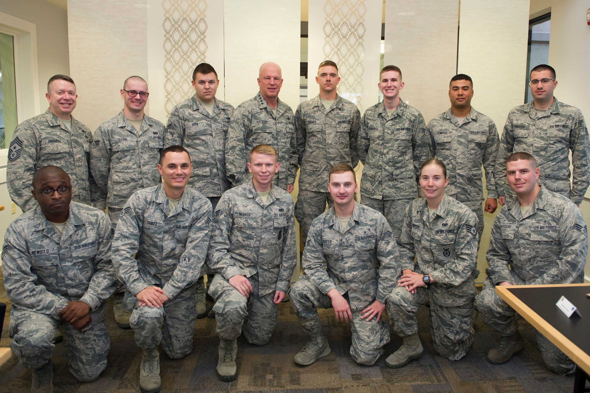 Gen. Jay Raymond, commander of Air Force Space Command, poses for a photograph with future Airman Leadership School students, March 8, 2017, at the Riverside Dining Facility at Patrick Air Force Base, Fla. The general spent time with the future NCOs and engaged in an open discussion over breakfast. (U.S. Air Force photo/Matthew Jurgens) 
