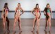 Bodybuilding competitors strike poses during their Bikini - Tall Class category judging at the Eglin Bodybuilding Classic contest March 18 at Eglin Air Force Base, Fla.  Four men and 10 women competed in various categories highlighting their fit and sculpted physiques. (U.S. Air Force photo/Samuel King Jr.)