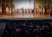 All of the bodybuilding competitors stand on stage and receive applause during the Eglin Bodybuilding Classic contest March 18 at Eglin Air Force Base, Fla.  Four men and 10 women competed in various categories highlighting their fit and sculpted physiques. (U.S. Air Force photo/Samuel King Jr.)
