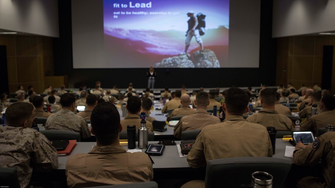 Karen Delich, a health specialist from Colorado Springs addresses students attending Weapons and Tactics Instructor Course  2-17 and Marine Aviation Weapons and Tactics Squadron One staff during a tactical risk management period of instruction at Marine Corps Air Station Yuma, Ariz., March 15, 2017.  WTI is a seven week event hosted by MAWTS-1. MAWTS-1 provides standardized tactical training and certification of unit instructor qualifications to support Marine Aviation Training and Readiness and assists in developing and employing Aviation Weapons and Tactics. 