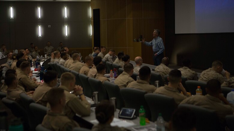 Mr. Beard, former Marine Corps aviator addresses students attending Weapons and Tactics Instructor Course 2-17 and Marine Aviation Weapons and Tactics Squadron One staff during a tactical risk management period of instruction at Marine Corps Air Station Yuma, Ariz., March 15, 2017.  WTI is a seven week event hosted by MAWTS-1. MAWTS-1 provides standardized tactical training and certification of unit instructor qualifications to support Marine Aviation Training and Readiness and assists in developing and employing Aviation Weapons and Tactics. 