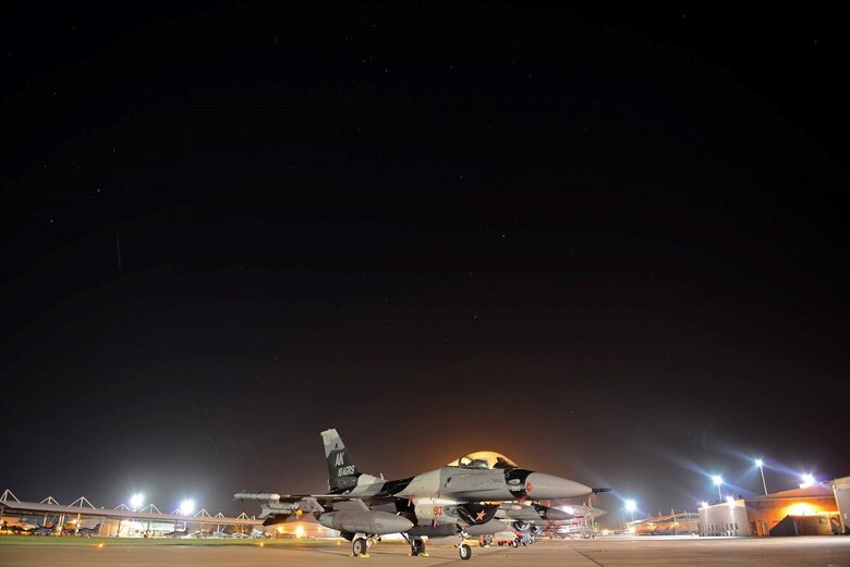 The U.S. Air Force 18th Aggressor Squadron F-16 Fighting Falcon flagship sits on the tarmac at Royal Australian Air Force Base Williamtown, in New South Wales, Australia, March 19, 2017. Pilots with the 18th Aggressor Squadron, Eielson Air Force Base, Alaska, are working with RAAF Air Warfare Centre instructors to train and prepare RAAF fighter combat instructors, airspace battle managers, fighter intelligence instructors and fighter combat controllers. (U.S. Air Force photo by Tech. Sgt. Steven R. Doty) 