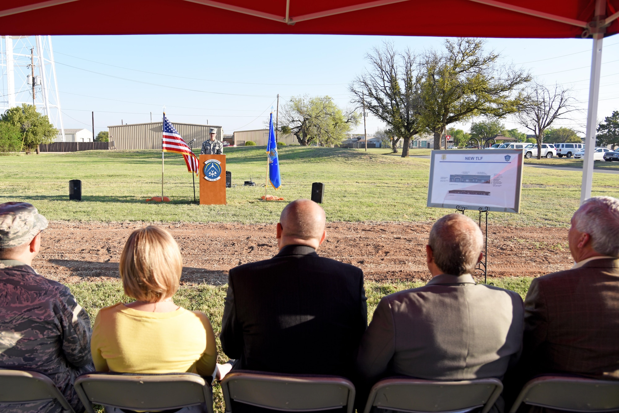 U.S. Air Force 2nd. Lt. Timothy Ruscio, 17th Civil Engineer Squadron operation engineer, provides the opening remarks for the new temporary lodging facility ground breaking near the base theater on Goodfellow Air Force Base, Texas March 20, 2017. The new TLF is designed to replace the 30-year-old units. (U.S. Air Force photo by Staff Sgt. Joshua Edwards/Released)