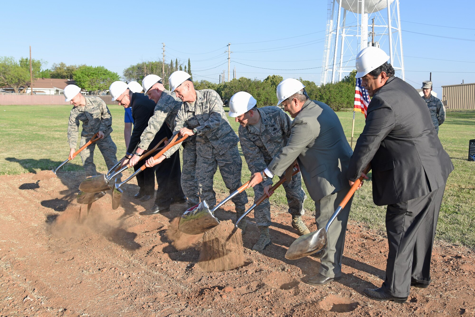 U.S. Air Force Col. Michael Downs, 17th Training Wing Commander, and team Goodfellow members break ground for the new temporary lodging facility near the base theater on Goodfellow Air Force Base, Texas March 20, 2017. The new TLF building is due for completion in late 2018. (U.S. Air Force photo by Staff Sgt. Joshua Edwards/Released)