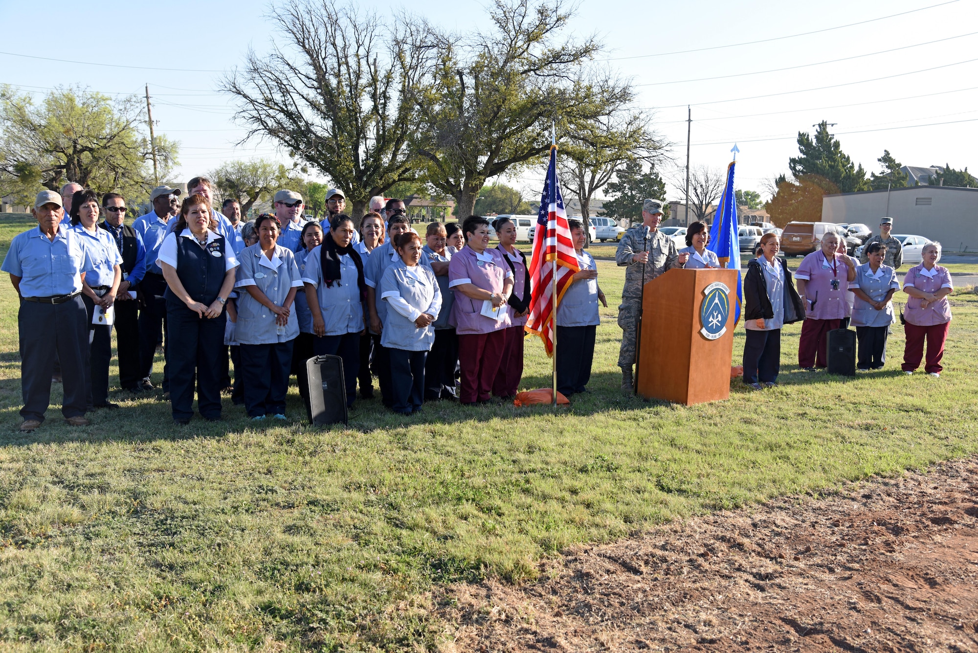 U.S. Air Force Col. Michael Downs, 17th Training Wing Commander, speaks during the new temporary lodging facility ground breaking near the base theater on Goodfellow Air Force Base, Texas March 20, 2017. During his speech, he invited all the hospitality staff to join him and thank them for their hard work. (U.S. Air Force photo by Staff Sgt. Joshua Edwards/Released)