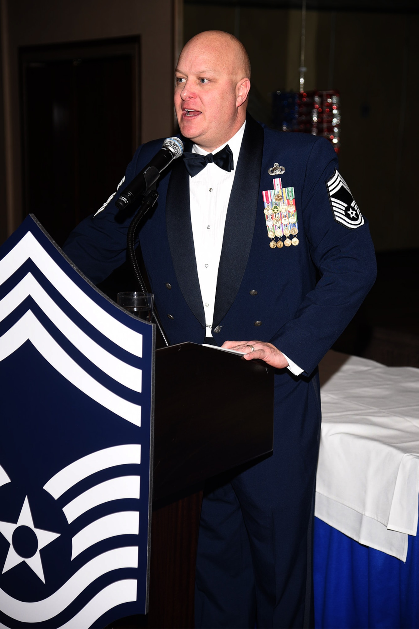 PETERSON AIR FORCE BASE, Colo. – Chief Master Sgt. Marty R. Rush, Air Force Space Command Public Affairs chief enlisted manager, who helped emcee the event, announces Chief Master Sgt. promotees March 17, 2017 at The Club, Peterson Air Force Base, Colo. The Annual Chief’s Induction Ceremony is hosted by the Colorado Springs Area Chief’s Group. (U.S. Air Force photo by Robb Lingley)