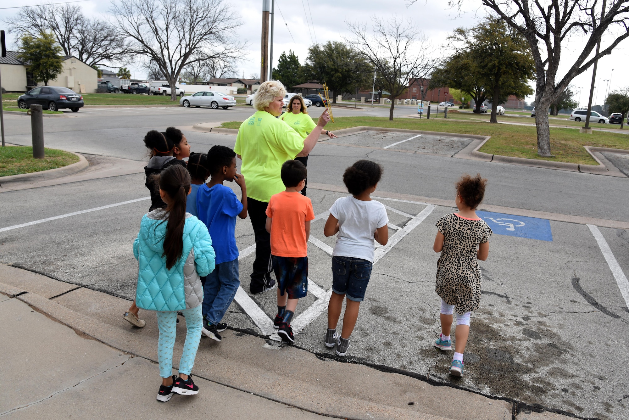 Catie Widenhofer, radKIDs instructor, teaches children to look both ways during a radKIDS class at the Youth Center on Goodfellow Air Force Base, Texas, March 16, 2017. radKIDS is a weeklong course teaching children various safety lessons. (U.S. Air Force photos by Staff Sgt. Joshua Edwards/Released)