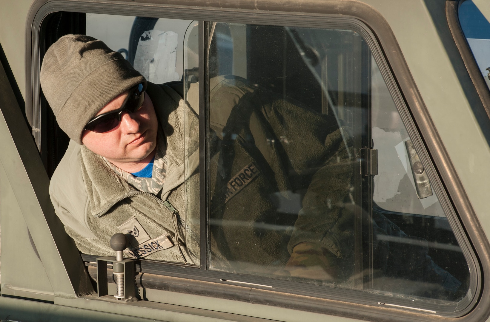 Staff Sgt. Ken Messick, 5th Logistics Readiness Squadron small air terminal programs NCO in charge, transports cargo onto a C-17 Globemaster III at Minot Air Force Base, N.D., March 3, 2017. Members of the 5th LRS deployment distributions flight planned and executed logistics operations and loaded cargo to support a U.S. Central Command deployment from Minot AFB. (U.S. Air Force photo/Airman 1st Class Jonathan McElderry)