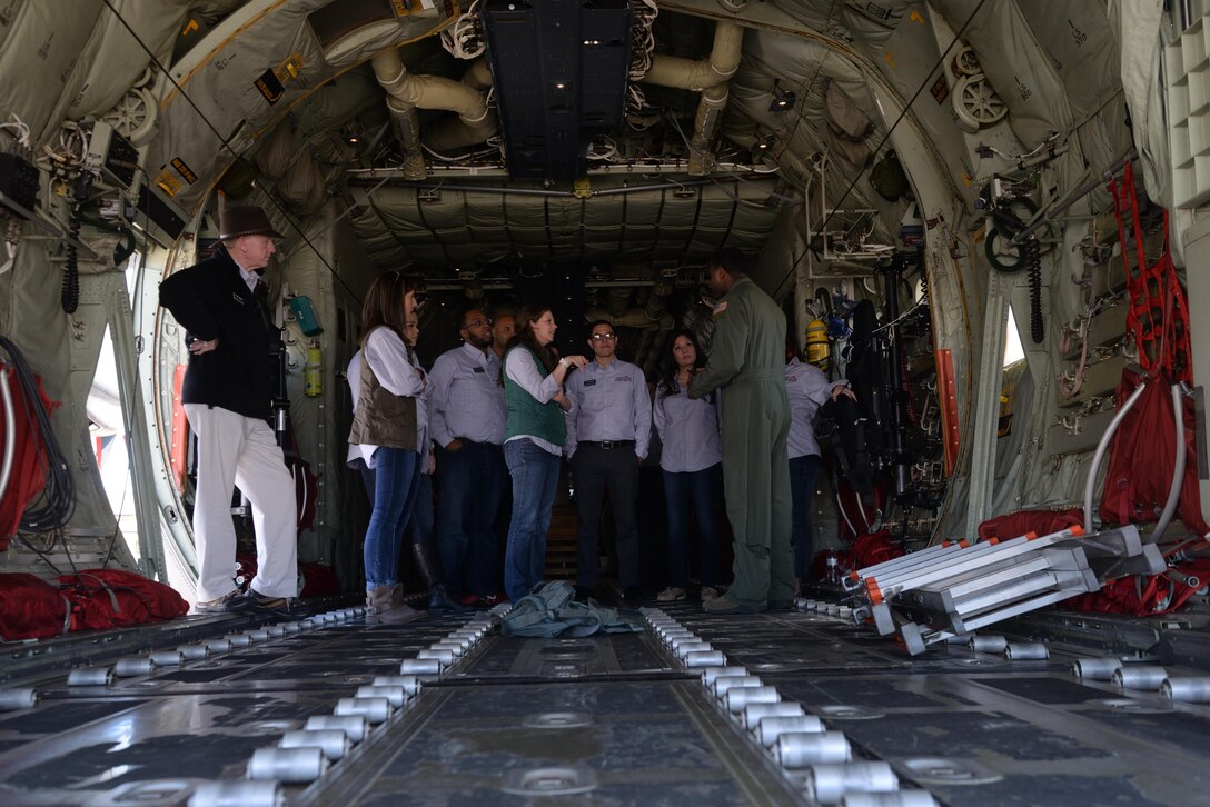 U.S. Air Force Senior Airman Brian Clark (right), 40th Airlift Squadron loadmaster, explains the capabilities of the C-130J Super Hercules to a group of Abilene leaders at Dyess Air Force Base, Texas, March 17, 2017. As a final stop on the tour for the Leadership Abilene Class of 2017, civic leaders were given the opportunity to fly on a C-130J Super Hercules in order to learn about the aircraft’s capabilities and mission. (U.S. Air Force photo by Airman 1st Class Rebecca Van Syoc)