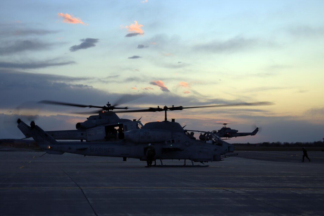 A group of UH-1Y Venoms and AH-1W Super Cobras land to conduct cold weather operations aboard Fort Drum, N.Y., March 8, 2017. The training, which began March 8, involves Marines with Marine Light Attack Helicopter Squadron 269, Marine Aircraft Group 29, 2nd Marine Aircraft Wing, along with other various units across the Department of Defense. The lessons learned from this training will serve as guidance that can be applied to operations all around the world, and make HMLA-269 a more valuable asset to the Air Combat Element of the Marine Corps. (U.S. Marine Corps photo by Cpl. Mackenzie Gibson/Released) 