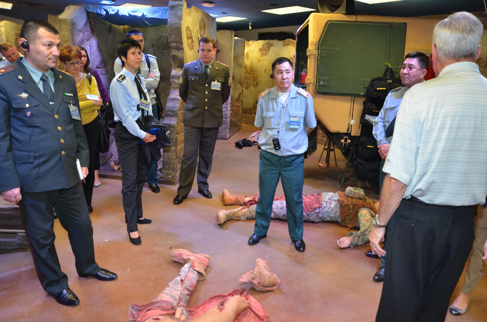 Participants in the CENTCOM Theater Medical Conference tour the Combat Trauma Patient Simulator in the Department of Combat Medic Training program at the Medical Education and Training Campus. In the CTPS, Army students apply their newly learned medical skills in a simulated combat environment. Medical professionals representing more than 10 countries within the US Central Command area of operation, Europe, and the U.S. attended the conference to aid in the continued development of capabilities that will serve to improve regional interoperability and cooperation. (Medical Education and Training Campus Public Affairs photo by Lisa Braun/Released)