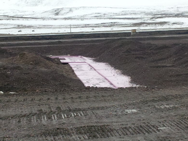 Researchers successfully attempted a repaving design that incorporated buried extruded polystyrene (foam insulation boards) to prevent permafrost thaw at the most critical locations on the runway.