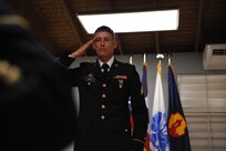 Sgt Richard Lopez, assigned to 390th Transportation Company, reports to the president of the board during the 1st Mission Support Command Best Warrior Competition held on Camp Santiago, Puerto Rico, March 17.