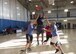 Airmen play a game of basketball during the 49th Wing Sports Day, March 17, 2017 at Holloman Air Force Base, N.M. Sports Day started off with a wing run, and continued with a number of events including volleyball, basketball, dodgeball and many more. (U.S. Air Force photo by Senior Airman Emily Kenney)