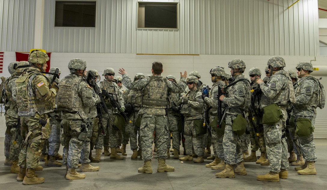 U.S. Army Reserve Soldiers assigned to the 423rd Military Police Company, 333rd Military Police Brigade, 200th Military Police Command, prepare for upcoming airlift mission on March 19, 2017, at McGuire-Dix-Lakehurst, N.J. The military police unit worked with the U.S. Air Force 621st Contingency Response Wing and the U.S. Air Force Reserve 732nd Airlift Squadron to complete a joint airlift mission during Warrior Exercise 78-17-01 which is designed to assess a units’ combat capabilities. Roughly 60 units from the U.S. Army Reserve, U.S. Army, U.S. Air Force, and Canadian Armed Forces are participating in the 84th Training Command’s joint training exercise, WAREX 78-17-01, at Joint Base McGuire-Dix-Lakehurst from March 8 until April 1, 2017; the WAREX is a large-scale collective training event designed to simulate real-world scenarios as America’s Army Reserve continues to build the most capable, combat-ready, and lethal Federal Reserve force in the history of the Nation. (Army Reserve Photo by Sgt. Stephanie Ramirez/ Released)
