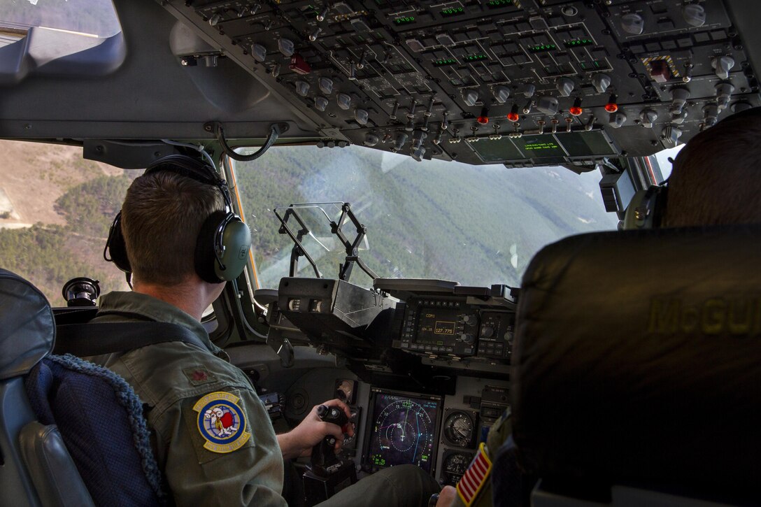 U.S. Air Force Reserve Maj. Kevin Shaffer, aircraft commander assigned to the 732nd Airlift Squadron, transports U.S. Army Reserve Soldiers assigned to the 423rd Military Police Company, 333rd Military Police Brigade, 200th Military Police Command, on March 19, 2017, to Lakehurst Maxfield Field. The military police unit worked with the U.S. Air Force 621st Contingency Response Wing and the U.S. Air Force Reserve 732nd Airlift Squadron to complete a joint airlift mission during Warrior Exercise 78-17-01 which is designed to assess a units’ combat capabilities. Roughly 60 units from the U.S. Army Reserve, U.S. Army, U.S. Air Force, and Canadian Armed Forces are participating in the 84th Training Command’s joint training exercise, WAREX 78-17-01, at Joint Base McGuire-Dix-Lakehurst from March 8 until April 1, 2017; the WAREX is a large-scale collective training event designed to simulate real-world scenarios as America’s Army Reserve continues to build the most capable, combat-ready, and lethal Federal Reserve force in the history of the Nation. (Army Reserve Photo by Sgt. Stephanie Ramirez/ Released)