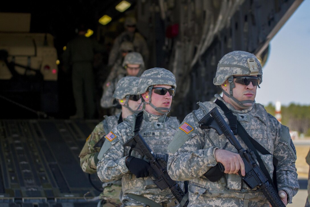 U.S. Army Reserve Soldiers assigned to the 423rd Military Police Company, 333rd Military Police Brigade, 200th Military Police Command, get of an Air Force C-17 Globemaster on March 19, 2017, at Lakehurst Maxfield Field. The military police unit worked with the U.S. Air Force 621st Contingency Response Wing and the U.S. Air Force Reserve 732nd Airlift Squadron to complete a joint airlift mission during Warrior Exercise 78-17-01 which is designed to assess a units’ combat capabilities. Roughly 60 units from the U.S. Army Reserve, U.S. Army, U.S. Air Force, and Canadian Armed Forces are participating in the 84th Training Command’s joint training exercise, WAREX 78-17-01, at Joint Base McGuire-Dix-Lakehurst from March 8 until April 1, 2017; the WAREX is a large-scale collective training event designed to simulate real-world scenarios as America’s Army Reserve continues to build the most capable, combat-ready, and lethal Federal Reserve force in the history of the Nation. (Army Reserve Photo by Sgt. Stephanie Ramirez/ Released)