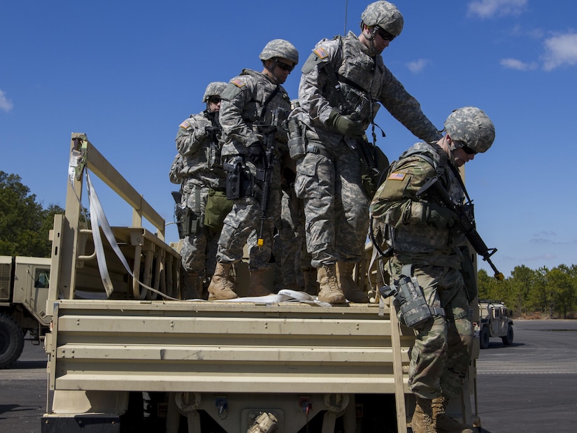 U.S. Army Reserve Soldiers assigned to the 423rd Military Police Company, 333rd Military Police Brigade, 200th Military Police Command, conduct convoy operations on March 19, 2017, at McGuire-Dix-Lakehurst, N.J. The military police unit worked with the U.S. Air Force 621st Contingency Response Wing and the U.S. Air Force Reserve 732nd Airlift Squadron to complete a joint airlift mission during Warrior Exercise 78-17-01 which is designed to assess a units’ combat capabilities. Roughly 60 units from the U.S. Army Reserve, U.S. Army, U.S. Air Force, and Canadian Armed Forces are participating in the 84th Training Command’s joint training exercise, WAREX 78-17-01, at Joint Base McGuire-Dix-Lakehurst from March 8 until April 1, 2017; the WAREX is a large-scale collective training event designed to simulate real-world scenarios as America’s Army Reserve continues to build the most capable, combat-ready, and lethal Federal Reserve force in the history of the Nation. (Army Reserve Photo by Sgt. Stephanie Ramirez/ Released)