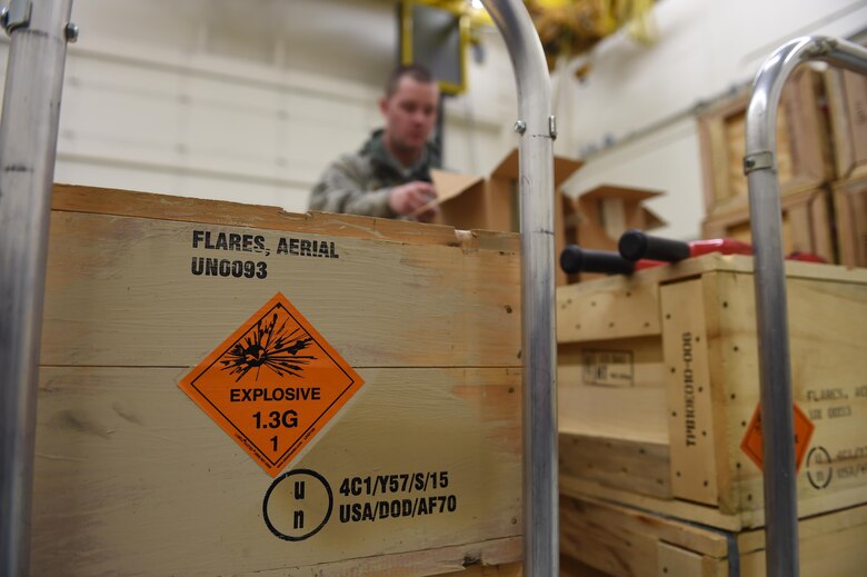 Staff Sgt. Chad Warner, 62nd Maintenance Squadron conventional maintenance production superintendent, unloads squibs or impulse cartridges, which provide a small propellant charge that ignite the flare stick, to build flares for the C-17 Globemaster III at Joint Base Lewis-McChord, Wash., March 14, 2017. A single C-17 flare system costs approximately $50,000 and are used as infrared countermeasures designed to defeat heat seeking surface-to-air missiles. (Air Force photo/ Staff Sgt. Naomi Shipley)