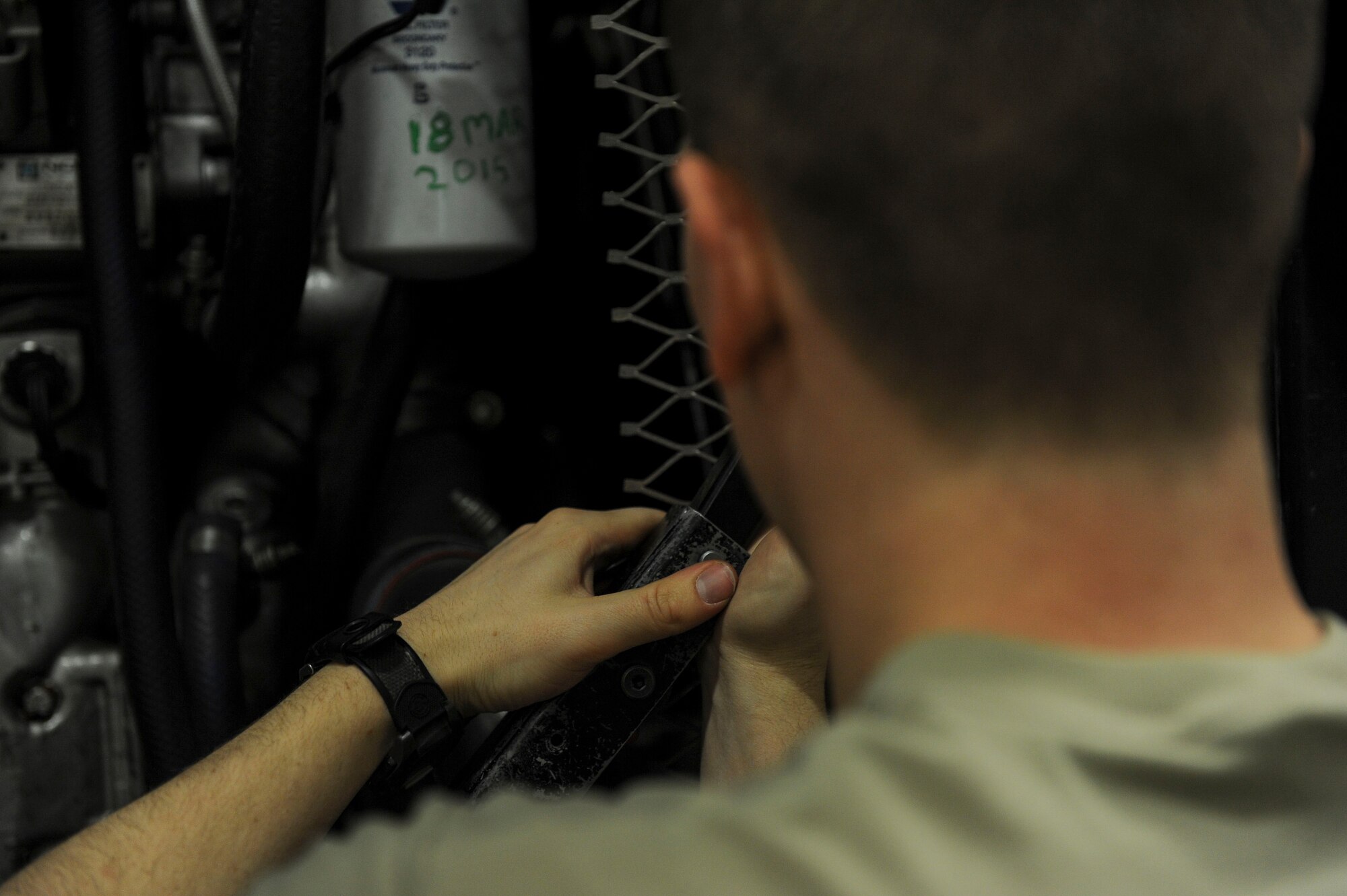 U.S. Air Force Airman 1st Class Sean Whittaker, a 354th Civil Engineer Squadron firefighter, secures a bolt on a fire truck March 13, 2017, at Eielson Air Force Base, Alaska. Not only does the Eielson fire department provide the base with fire protection services, but they also provide support off-base when necessary. (U.S. Air Force photo by Airman 1st Class Isaac Johnson)