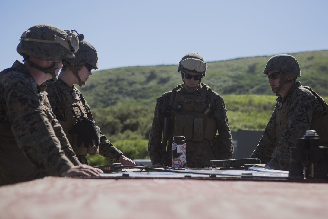 Marines with 3rd Low Altitude Air Defense Battalion, 3rd Marine Aircraft Wing, I Marine Expeditionary Force, plan during a firing exercise March 13, 2017, at Marine Corps Base Camp Pendleton, Calif. The exercise allowed Marines to use stinger launch simulators in conjunction with real aircraft acting as targets. (Marine Corps photo by Lance Cpl. A. J. Van Fredenberg)