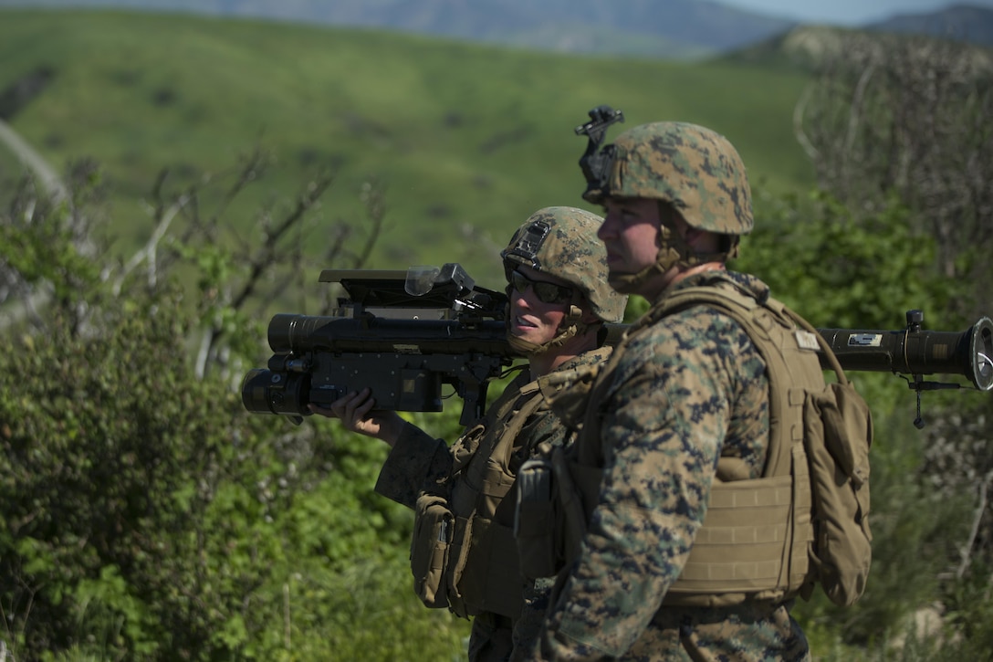 Marines with 3rd Low Altitude Air Defense Battalion, 3rd Marine Aircraft Wing, I Marine Expeditionary Force, prepare for the next shot during a firing exercise March 13, 2017,  at Marine Corps Base Camp Pendleton, Calif. The exercise allowed Marines to use stinger launch simulators in conjunction with real aircraft acting as targets. (Marine Corps photo by Lance Cpl. A. J. Van Fredenberg)