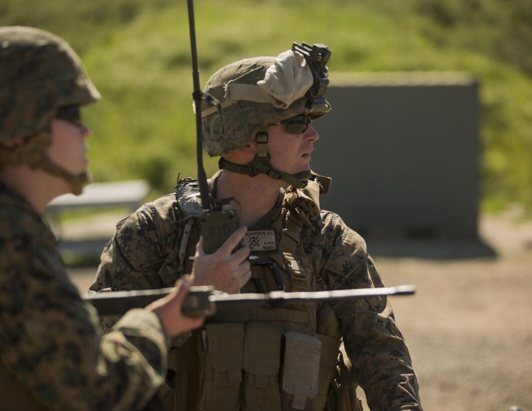 Sgt. Dale P. Richardson, noncommissioned officer in charge of Battery A, 3rd Low Altitude Air Defense Battalion, 3rd Marine Aircraft Wing, I Marine Expeditionary Force, receives a radio report from LAAD gunners during the firing exercise March 13, 2017, at Marine Corps Base Camp Pendleton, Calif. The exercise allowed Marines to use stinger launch simulators in conjunction with real aircraft acting as targets. (Marine Corps photo by Lance Cpl. A. J. Van Fredenberg)
