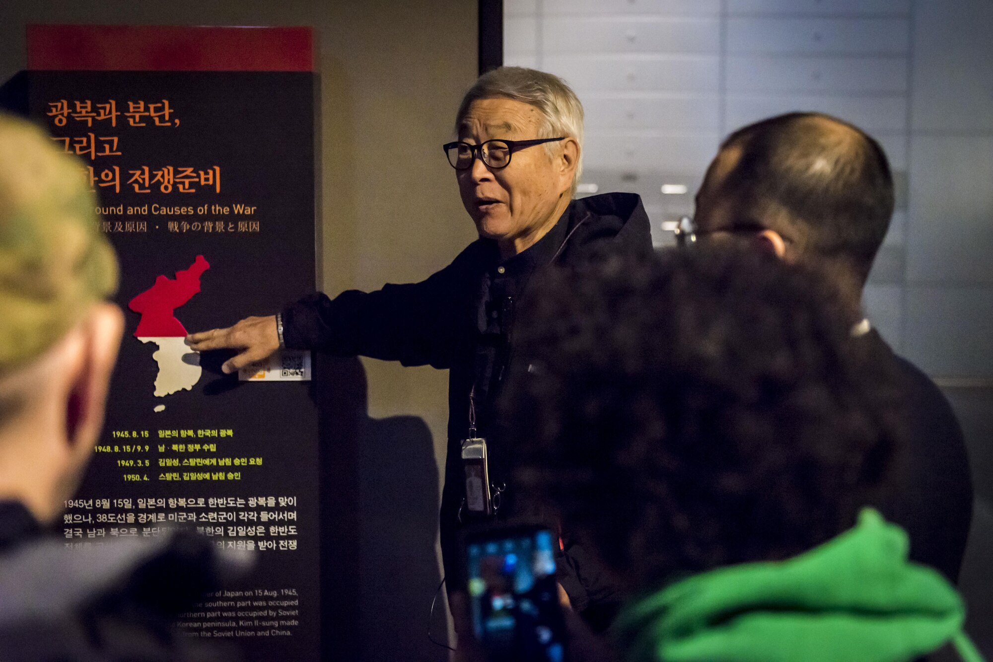 Lee Song Ha, a War Memorial of Korea tour guide, explains the dividing line of North and South Korea with 30 U.S. service members who volunteered for the chance to experience the country they’re here to protect during a cultural heritage tour in Seoul, Republic of Korea, March 18, 2017. At the end of World War II, the Japanese colony of Korea was to be freed and united as a single nation. During the transition, American and Soviet soldiers were needed to keep the peace. The dividing line between the American and Soviet zones was the 38th parallel roughly dividing the country in two. (U.S. Air Force photo by Staff Sgt. Benjamin W. Stratton)