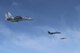 A U.S. Air Force B-1B Lancer flies in formation with Japan Air Self Defense Force F-15s in the vicinity of Japan March 21, 2017. The sortie was carried out as part of U.S. Pacific Command's continuous bomber presence mission.
