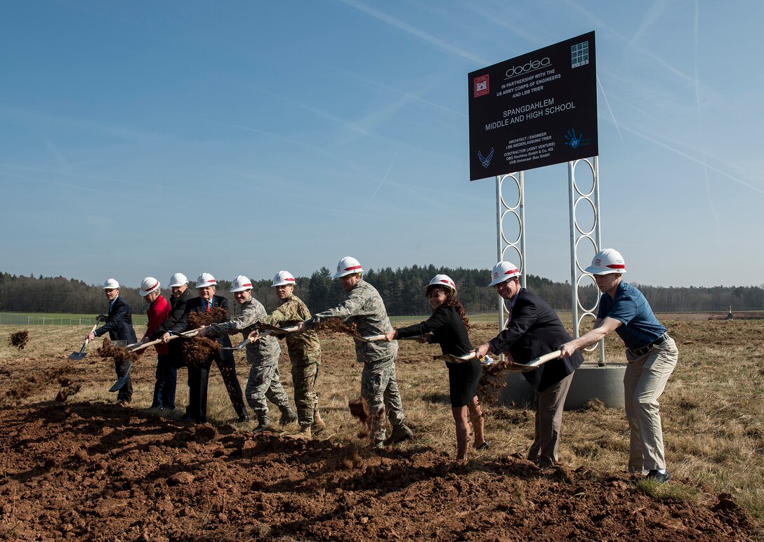 Base leadership, U.S. Army Corps of Engineers and local government and construction officials participated in a ground breaking ceremony at the future site of the middle/high school on Spangdahlem Air Base, Germany, Mar. 16, 2017. The school is estimated completion time is summer of 2019. (U.S. Air Force photo by Tech. Sgt. Chad Warren)