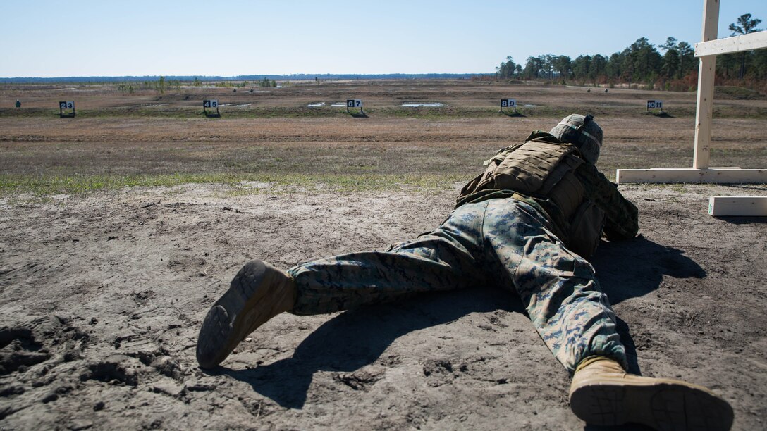 Sgt. Daniel Grant, a mortarman with Special Purpose Marine Air-Ground Task Force - Southern Command, assumes the prone position while firing at an unknown distance target on a Table 3 range during pre-deployment training at Range K501 on Marine Corps Base Camp Lejeune, North Carolina, March 16, 2017.  The training was conducted to enhance the Ground Combat Element’s readiness for future security cooperation operations in Central America. 