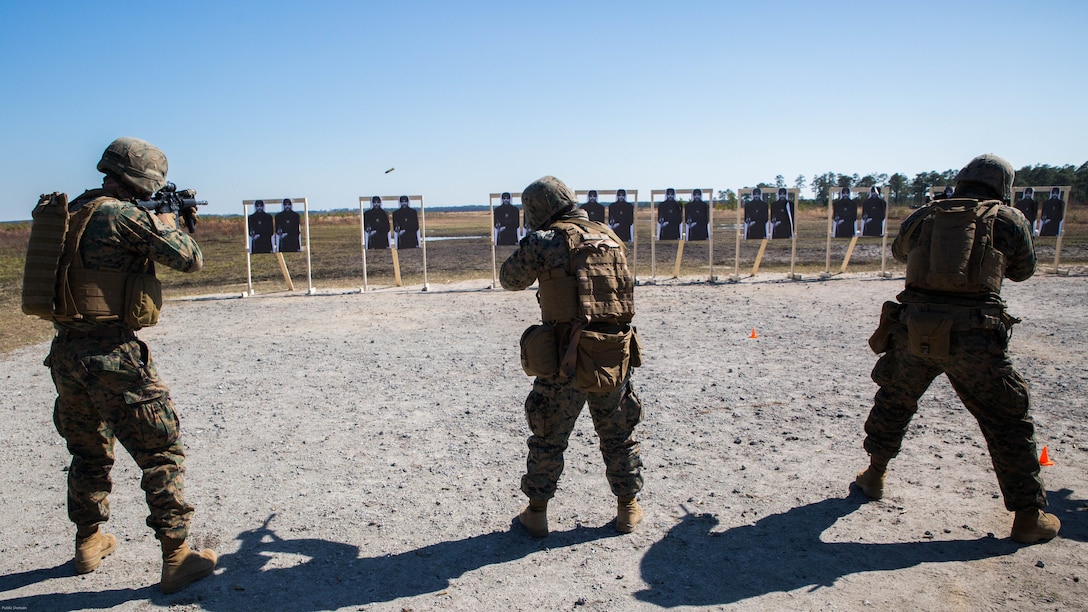 Marines with Special Purpose Marine Air-Ground Task Force - Southern Command conduct a Table 5 short distance range during pre-deployment training at Range K-501A on Marine Corps Base Camp Lejeune, North Carolina, March 16, 2017. The training was conducted to enhance the Ground Combat Element’s readiness for future security cooperation operations in Central America. 