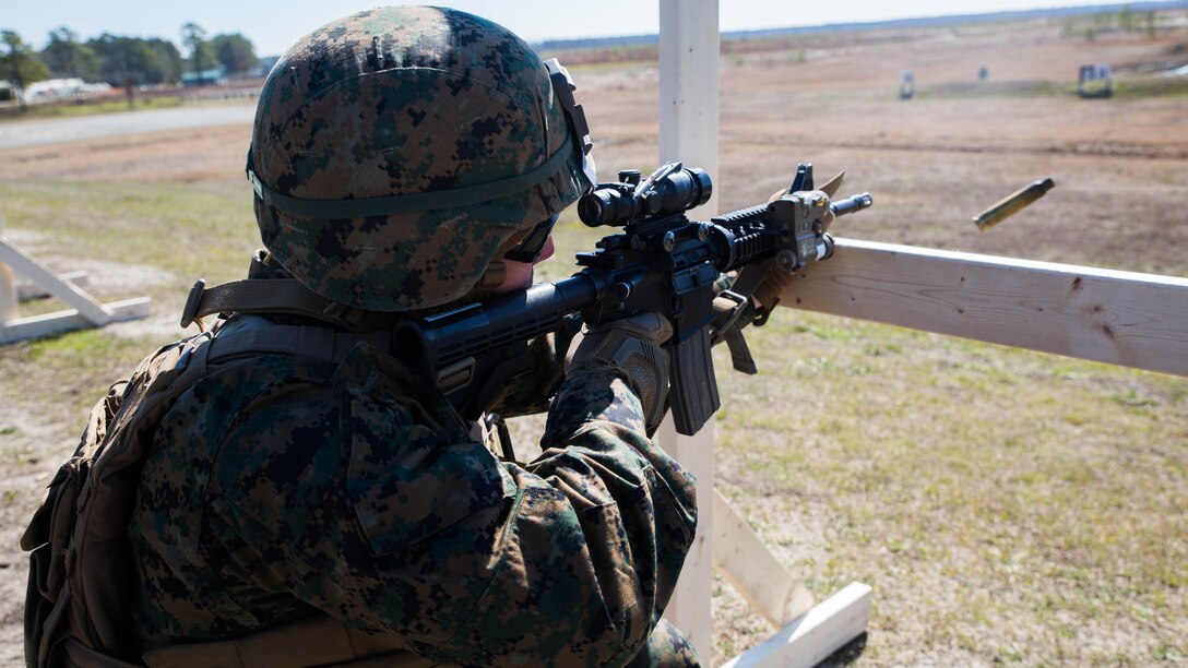 Sgt. Jeffrey C. Senger, a machine gunner with Special Purpose Marine Air-Ground Task Force - Southern Command, fires his M4 carbine on a Table 3 unknown distance range during pre-deployment training at Range K-501 on Marine Corps Base Camp Lejeune, North Carolina, March 16, 2017. The training was conducted to enhance the Ground Combat Element’s readiness for future security cooperation operations in Central America. 