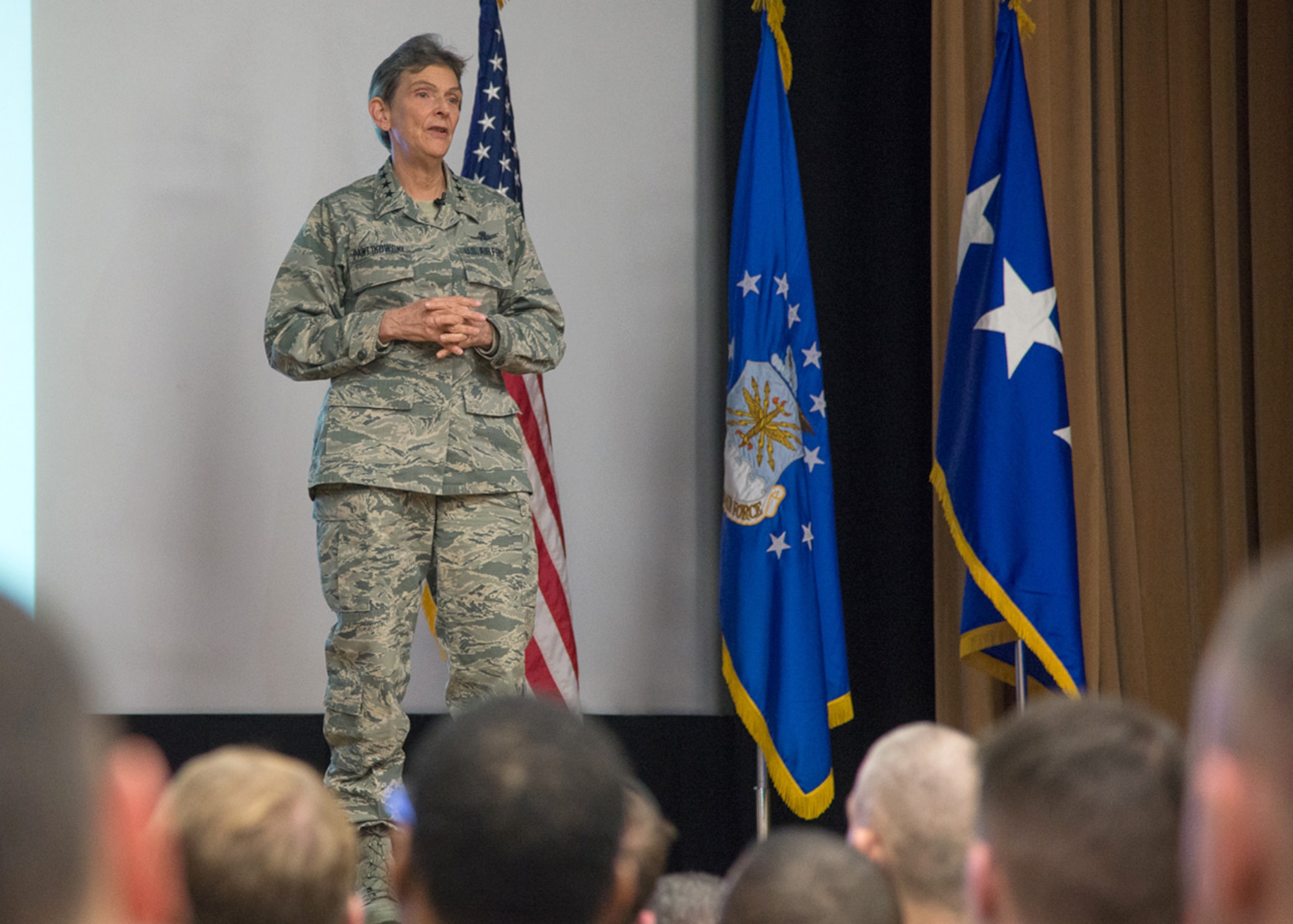 Gen. Ellen M. Pawlikowski, Air Force Materiel Command commander, speaks to employees during an all call at the base theater March 17. During the session, the general addressed the Air Force priorities as they relate to Air Force Chief of Staff Gen. David L. Goldfein’s three focus areas and the command’s strategic plan, goals and objectives. (U.S. Air Force photo by Mark Herlihy)