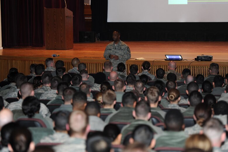 Chief Master Sgt. Calvin Williams, Air Force Global Strike command chief, speaks during an enlisted all-call at Minot Air Force Base, N.D., March 9, 2017. Force distribution and family were the key topics of discussion during his visit. (U.S. Air Force photo/Senior Airman Kristoffer Kaubisch)