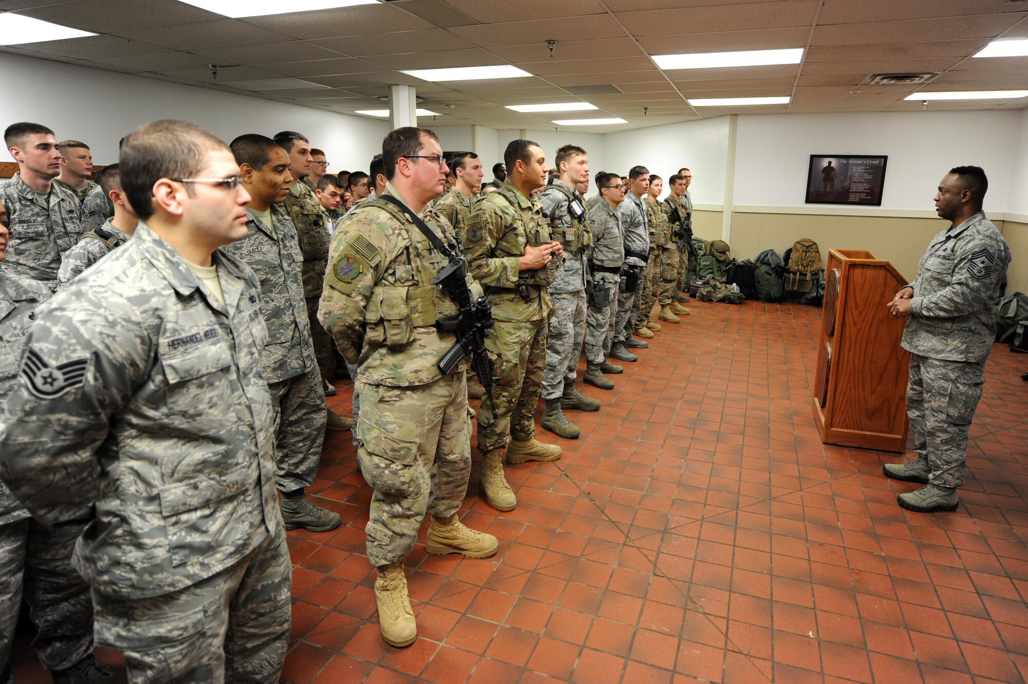 Chief Master Sgt. Calvin Williams, Air Force Global Strike Command command chief, speaks with Airmen from the 5th Security Forces Squadron at Minot Air Force Base, N.D., March 9, 2017. Williams talked about potential special duty pay and controlled tours for defenders.(U.S. Air Force photo/Senior Airman Kristoffer Kaubisch)