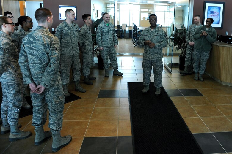 Chief Master Sgt. Calvin Williams, Air Force Global Strike command chief, speaks with Airmen from base operations at Minot Air Force Base, N.D., March 9, 2017. Williams visited several units on base to discuss the importance of their missions. (U.S. Air Force photo/Senior Airman Kristoffer Kaubisch)