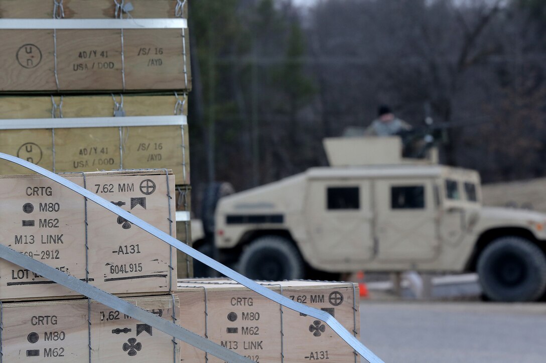 Boxes of 7.62mm ammunition sit on pallets, ahead of use, on a vehicle crew night live-fire gunnery qualification range during the Operation Cold Steel exercise conducted at Fort McCoy, Wisconsin, Mar. 20, 2017. Operation Cold Steel is the U.S. Army Reserve’s first large-scale live-fire training and crew-served weapons qualification and validation exercise. Cold Steel plays a critical role in ensuring that America’s Army Reserve units and Soldiers are trained and ready to deploy on short-notice and bring combat-ready and lethal firepower in support of the Total Army and Joint Force partners anywhere in the world. In support of the Total Army Force, First Army Master Gunners participated in Cold Steel to provide expertise in crew level gunnery qualifications, and to develop Vehicle Crew Evaluator training, preparing units here and when they return to their home stations to conduct crew served weapons training and vehicle crew gunnery at the unit-level. 475 crews with an estimated 1,600 Army Reserve Soldiers will certify in M2, M19 and M240 Bravo gunner platforms across 12-day rotations through the seven-week exercise. 
(U.S. Army Reserve photo by Master Sgt. Anthony L. Taylor)