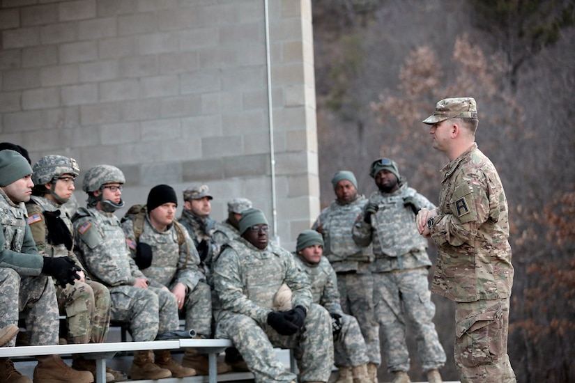 Sgt. 1st Class Larry McCracken, right, First Army Master Gunner assigned to 3-340th Training Support Battalion, 181st Infantry Brigade, conducts a brief to vehicle gunnery crews ahead of a night live-fire gunnery qualification during the Operation Cold Steel exercise conducted at Fort McCoy, Wisconsin, Mar. 20, 2017. Operation Cold Steel is the U.S. Army Reserve’s first large-scale live-fire training and crew-served weapons qualification and validation exercise. Cold Steel plays a critical role in ensuring that America’s Army Reserve units and Soldiers are trained and ready to deploy on short-notice and bring combat-ready and lethal firepower in support of the Total Army and Joint Force partners anywhere in the world. In support of the Total Army Force, First Army Master Gunners participated in Cold Steel to provide expertise in crew level gunnery qualifications, and to develop Vehicle Crew Evaluator training, preparing units here and when they return to their home stations to conduct crew served weapons training and vehicle crew gunnery at the unit-level. 475 crews with an estimated 1,600 Army Reserve Soldiers will certify in M2, M19 and M240 Bravo gunner platforms across 12-day rotations through the seven-week exercise. 
(U.S. Army Reserve photo by Master Sgt. Anthony L. Taylor)