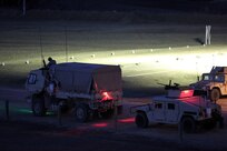 Vehicle gunnery crews line up in their firing order ahead of a night live-fire gunnery qualification during the Operation Cold Steel exercise conducted at Fort McCoy, Wisconsin, Mar. 20, 2017. Operation Cold Steel is the U.S. Army Reserve’s first large-scale live-fire training and crew-served weapons qualification and validation exercise. Cold Steel plays a critical role in ensuring that America’s Army Reserve units and Soldiers are trained and ready to deploy on short-notice and bring combat-ready and lethal firepower in support of the Total Army and Joint Force partners anywhere in the world. In support of the Total Army Force, First Army Master Gunners participated in Cold Steel to provide expertise in crew level gunnery qualifications, and to develop Vehicle Crew Evaluator training, preparing units here and when they return to their home stations to conduct crew served weapons training and vehicle crew gunnery at the unit-level. 475 crews with an estimated 1,600 Army Reserve Soldiers will certify in M2, M19 and M240 Bravo gunner platforms across 12-day rotations through the seven-week exercise. 
(U.S. Army Reserve photo by Master Sgt. Anthony L. Taylor)